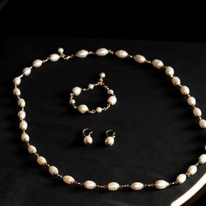 Pearl necklace bracelet and earrings set